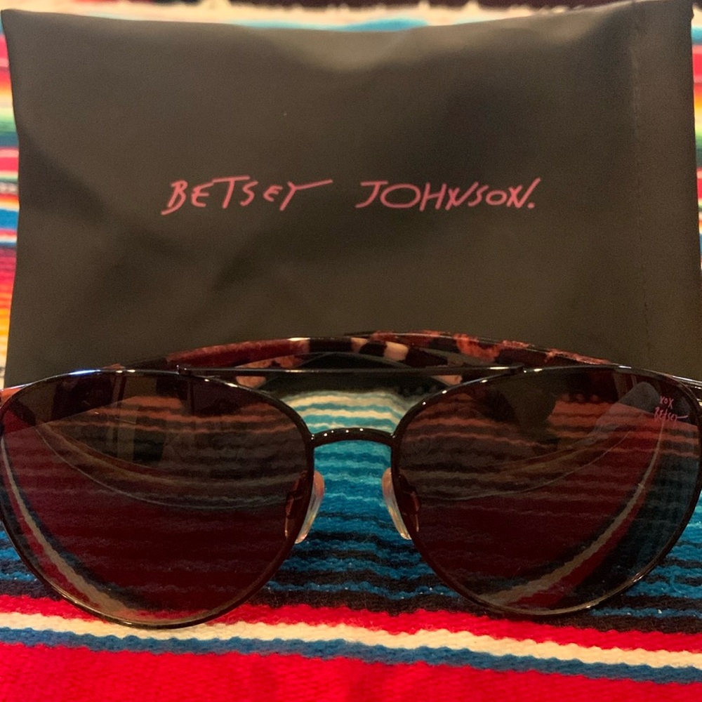 Woman’s aviator sunglasses by Betsy Johnson